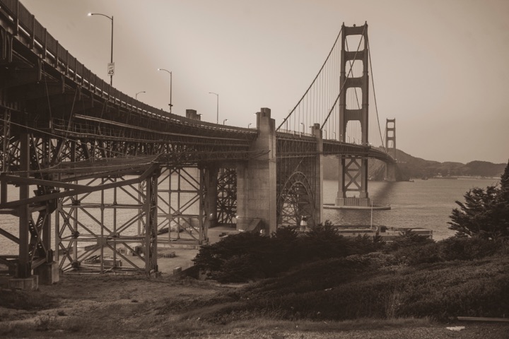 Sepia-toned view of the Golden Gate Bridge from below